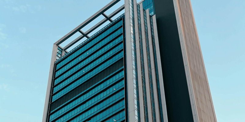 a tall building with a sky background